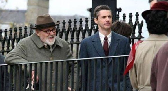 Anthony Hopkins as Sigmund Freud and Matthew Goode as C. S. Lewis