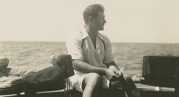 Hemingway on his fishing boat.