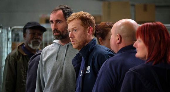 Kris Hitchen as Ricky with other workers looking distressed in Sorry We Missed You.