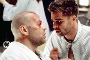 Bruce Willis as Cole and Brad Pitt as patient