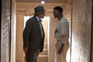 Harrison Ford as Branch and Chadwick Boseman as Jackie