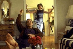 Kevin Spacey as Lester Burnham and Annette Bening as Carolyn Burnham