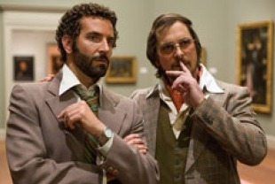 Bradley Cooper as Richie and Christian Bale as Irving