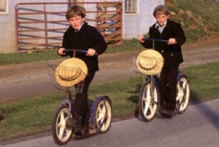 Amish boys on scooters