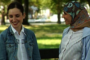 Zoe Lister-Jones as Rochel and Francis Benhamou as Nasira