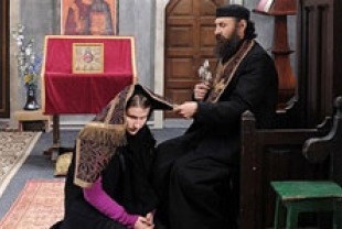 Cristina Flutur as Alina and Valeriu Andriuta as the priest