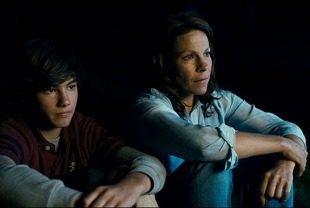 Silas Yelich as Atticus and Lili Taylor as Nicole