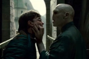 Daniel Radcliffe as Harry and Ralph Fiennes as Voldemort