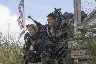 Emily Blunt as Rita and Tom Cruise as and Bill Cage