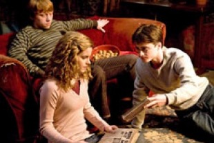 Rupert Grint as Ron, Emma Watson as Hermoine, and Daniel Radcliffe as Harry
