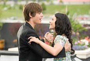 Zac Efron as Troy and Vanessa Hudgens as Gabriella