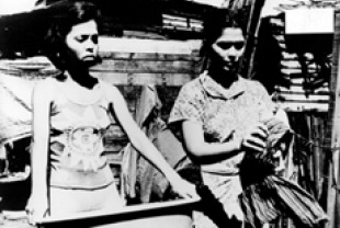 Hilda Koronel (right) as Insiang