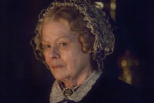 JudiDench as Mrs. Fairfax