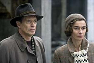 Steve Buscemi as Dr. Robert Wilson and Anne Consigny as Valerie Dupres