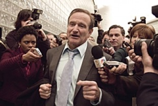 Robin Williams as Tom Dobbs, presidential candidate