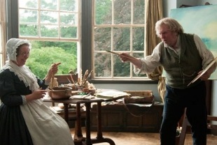 Marion Bailey as Mrs. Booth and Timothy Spall as Mr. Turner