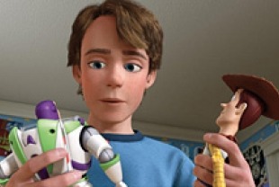 Andy with Buzz Lightyear and Woody