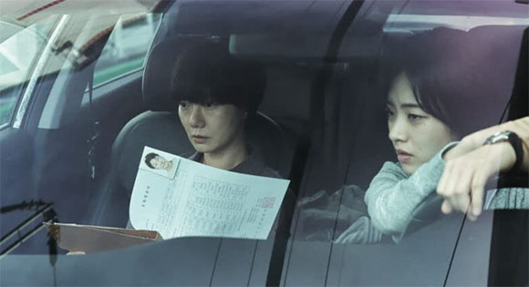 Bae Doona and Lee Joo-young as police officers