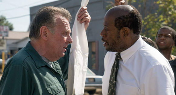 Tom Wilkinson as Griffin and Forest Whitaker as Rev. David Kennedy in Burden