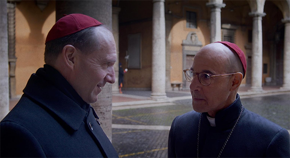 Ralph Fiennes as Cardinal Lawrence and Stanley Tucci as Cardinal Bellini