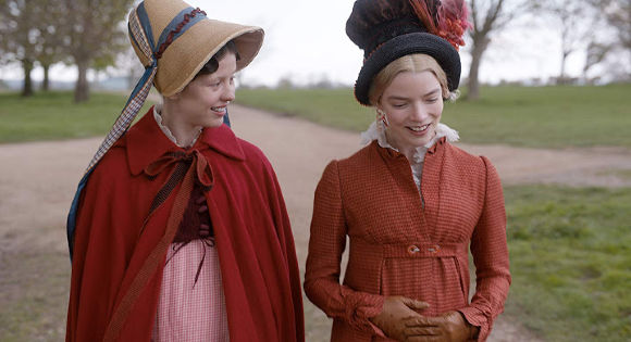Mia Goth as Harriet and Anya Taylor-Joy as Emma in Emma.
