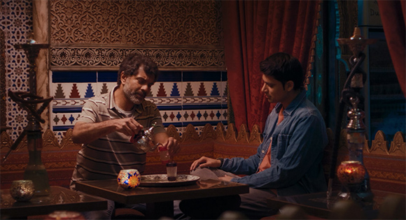 Ezra Faroque Khan and Antonio Aakeel having tea