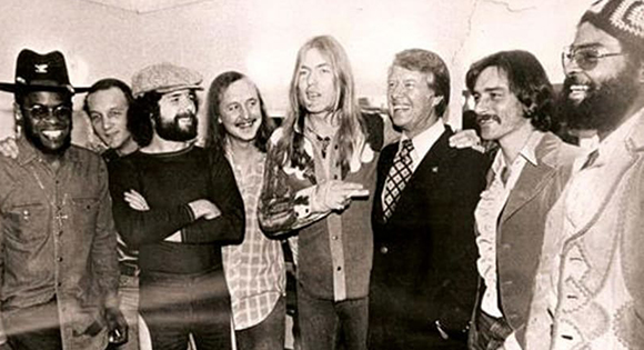 Gregg Allman and members of the Allman Brothers band with Jimmy Carter