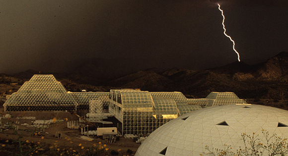 Aerial view of Biosphere 2 during a lightning storm.