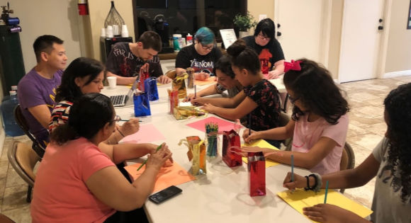 Apartment residents drawing their favorite parts of the apartment complex.