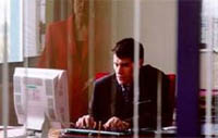 Jalil Lespert as Frank: in the boss's office