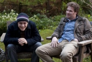 Joseph Gordon-Levitt as Adam and Seth Rogan as Kyle