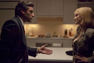 Oscar Isaac as  Abel and Jessica Chastain as Anna
