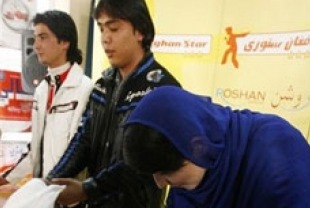 Hameed (center)