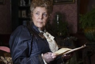 Pauline Collins as Mrs. Baker