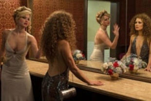Jennifer Lawrence as Rosalyn and Amy Adams as Syndey
