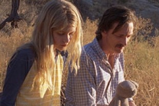 Ryan Simpkins as Greta and John Hawkes as Tom
