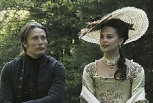 Mads Mikkelsen as Johann Friedrich Struensee and Alicia Vikander as Caroline Mathilde