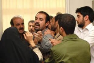 at center Shahab Hosseini as Hodjat