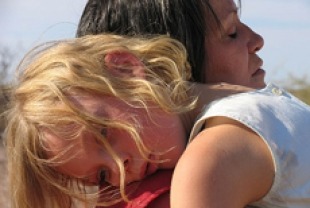 Adriana Barraza as Amelia and Elle Fanning as Debbie