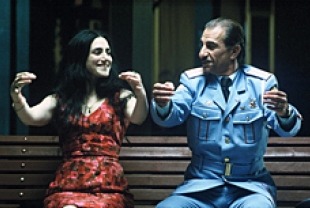 Ronit Elkabetz as Dina and Sasson Gabai as Tewfiq