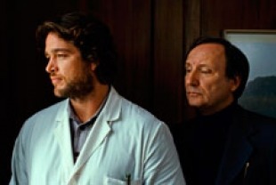 Ronald Zehrfeld as Andre and Rainer Bock as Schutz