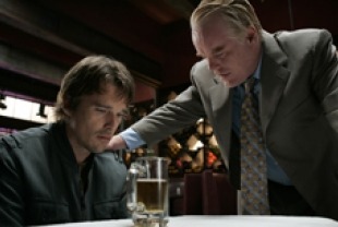 Philip Seymour Hoffman as Andy and Ethan Hawke as Hank