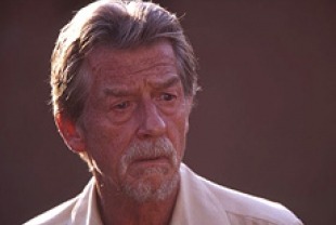 John Hurt as Father Christopher