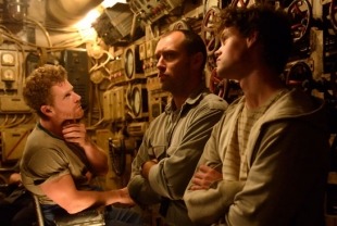 Branwell Donaghey as Gittens, Jude Law as Robinson and Bobby Schofield as Tobin