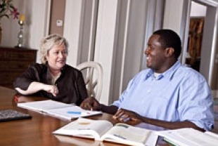Kathy Bates as Miss Sue and Quinton Aaron as Michael Oher