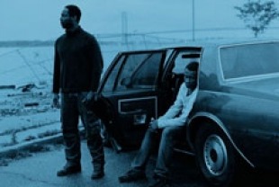 Isaiah Washington as John and Tequan Richmond as Lee