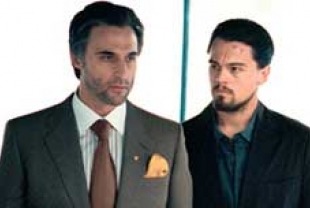 Mark Strong as Hani Salaam and Leonardo DiCaprio as Roger Ferris