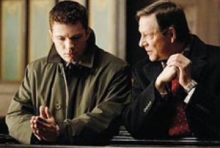 Ryan Phillippe as Eric O'Neill and Chris Cooper as Robert Hanssen