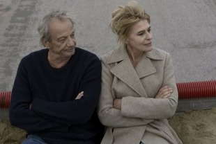 Patrick Chesnais as Philippe and Fanny Ardant as Caroline