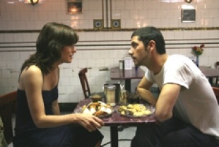 Parker Posey as Nora and Melvil Poupaud as Julien
